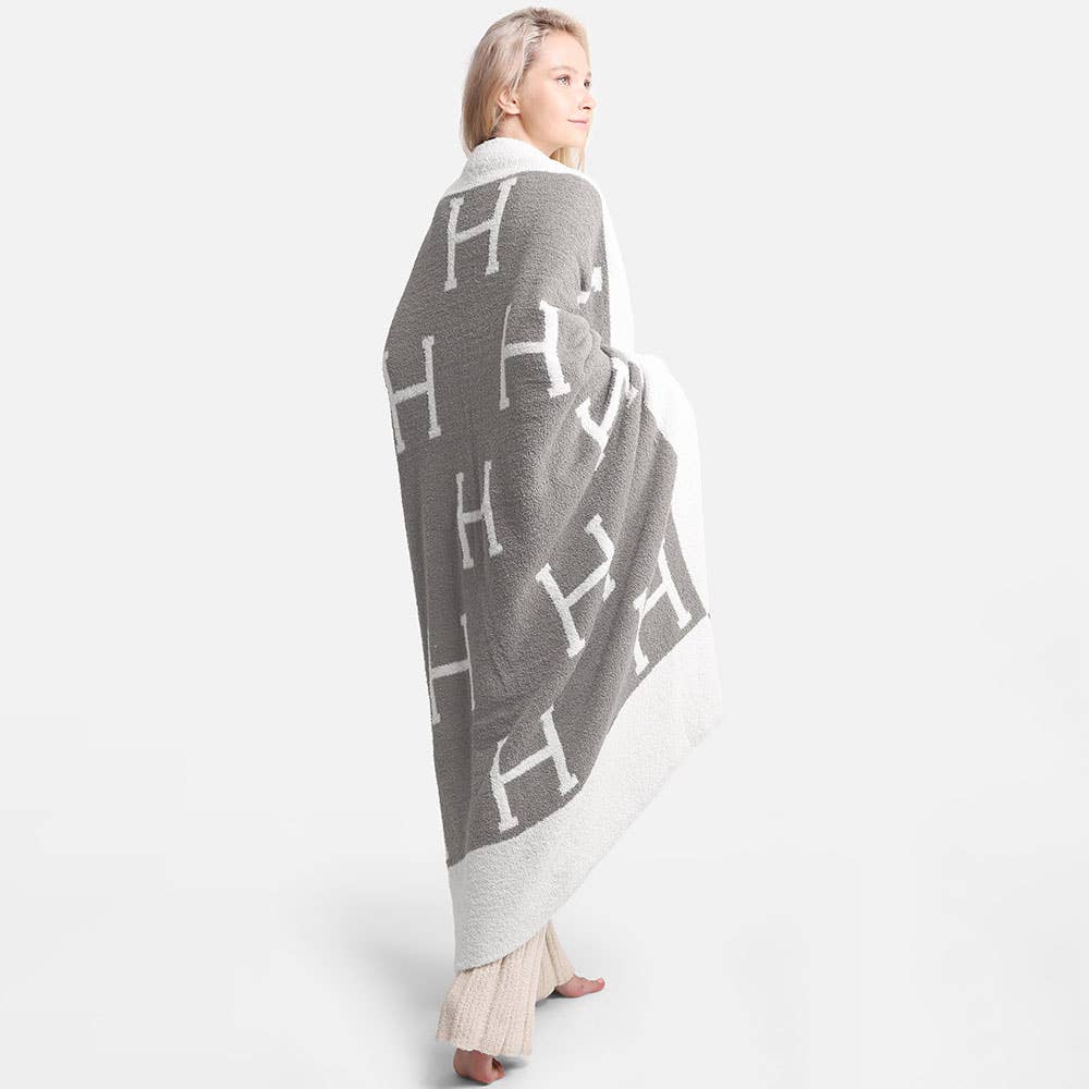 H Initial Monogram Patterned Reversible Throw Blanket: Black faux Hermes