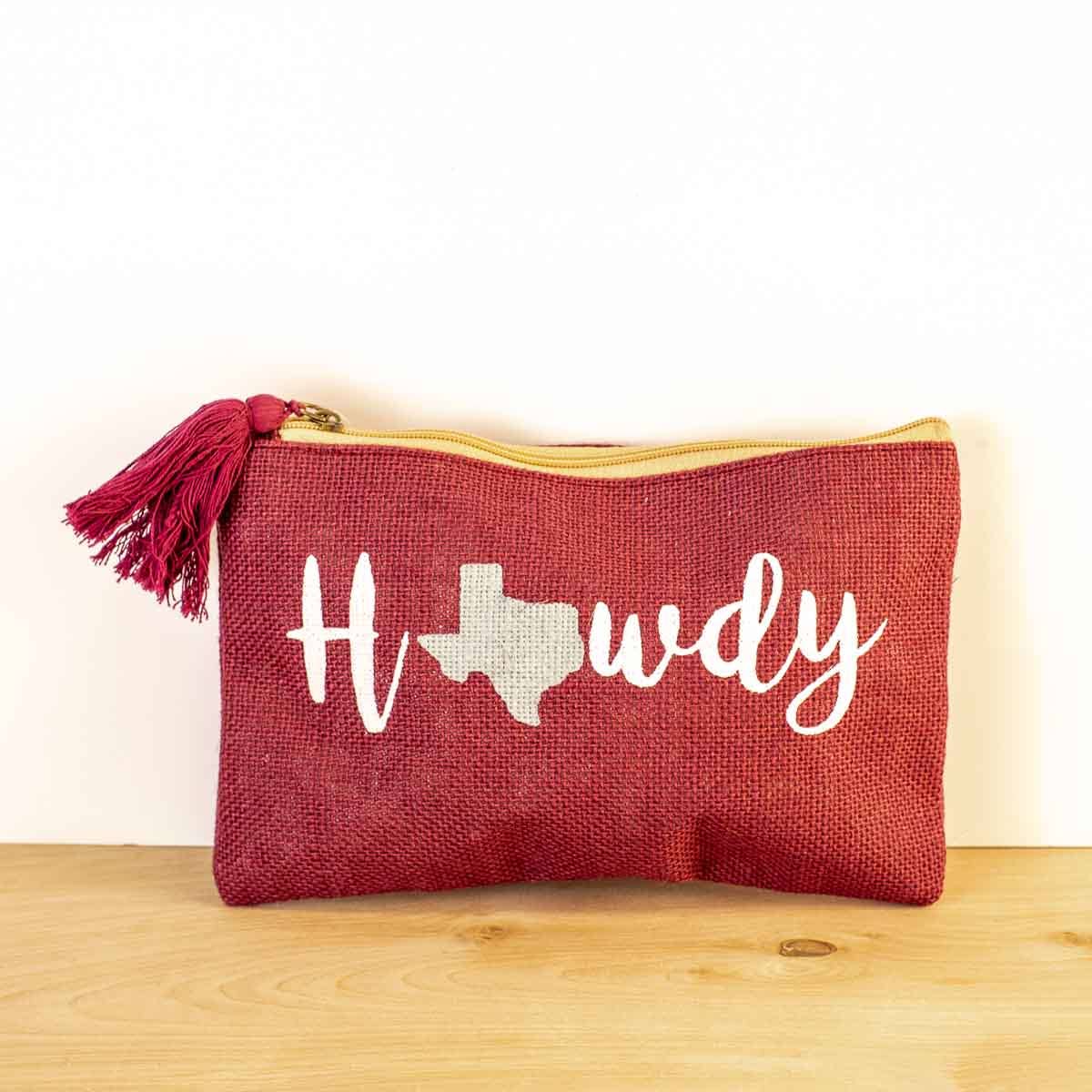 Howdy Cosmetic Bag   Maroon/White/Gray 10x6.    The Royal Standard