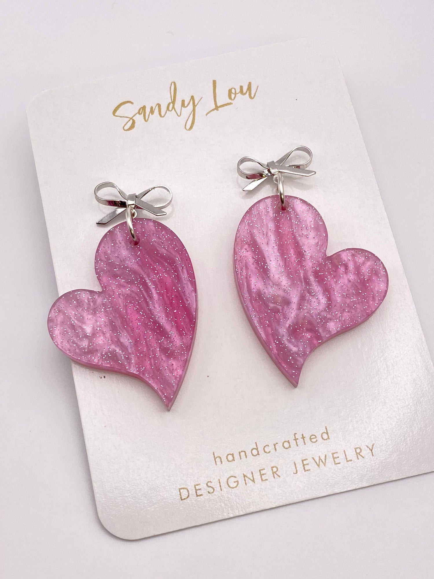 VALENTINE PINK SHIMMER WITH SILVER BOW HEART EARRINGS
