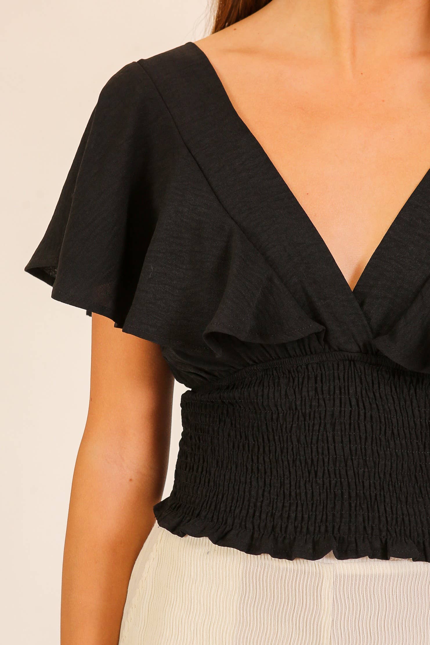 Spring Flutter Sleeve Smocked Wrap Top: Black / S