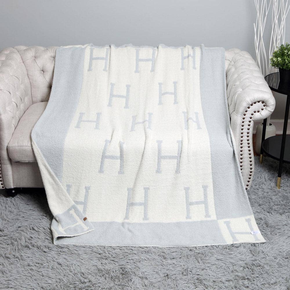 H Initial Monogram Patterned Reversible Throw Blanket: Black faux Hermes