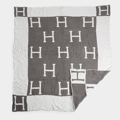 H Initial Monogram Patterned Reversible Throw Blanket: Black faux Hermes