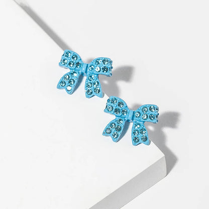 Crystal Rhinestone Bow Stud Earrings: Lt Col Topaz