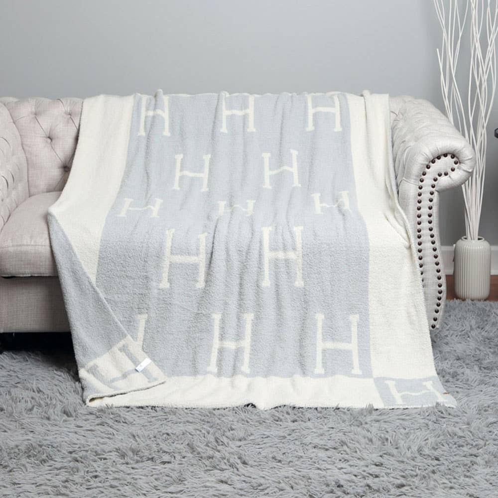 H Initial Monogram Patterned Reversible Throw Blanket: Black faux Hermes