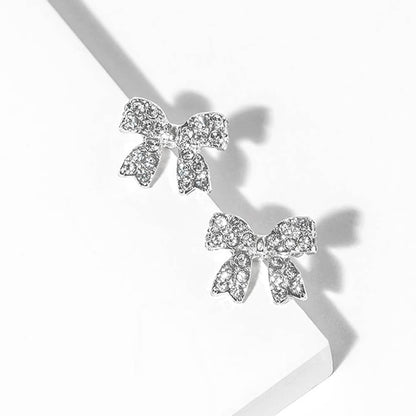 Crystal Rhinestone Bow Stud Earrings: Clear,Rhodium