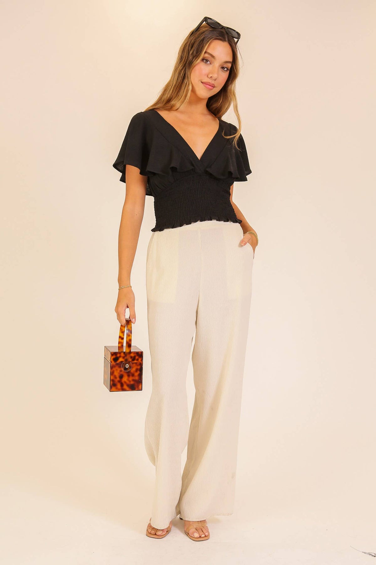 Spring Flutter Sleeve Smocked Wrap Top: Black / M
