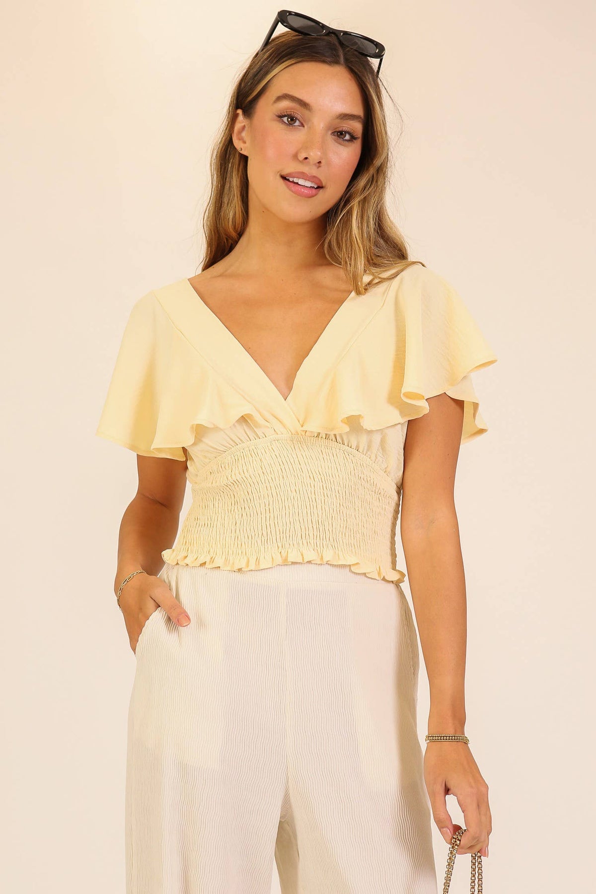 Spring Flutter Sleeve Smocked Wrap Top: Black / M